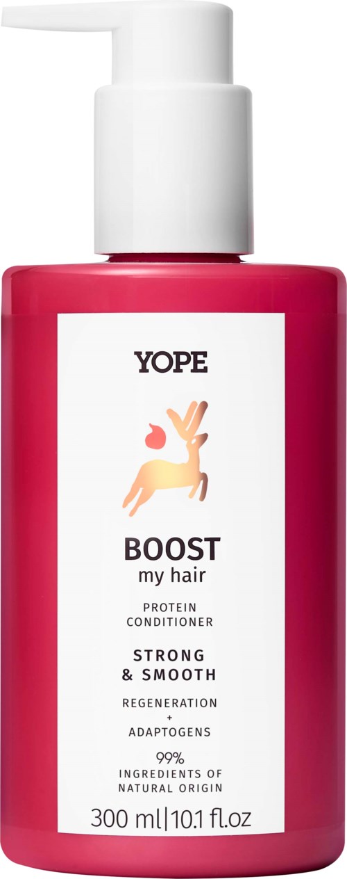 Eine rosa Flasche Haarspülung mit der Aufschrift "YOPE BOOST my hair" und Ziegenillustration sowie Produktdetails.