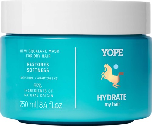Blauer Behälter für Yope-Haarmaske bei trockenen Haaren mit Einhorn-Logo und Produktdetails in Weiß.