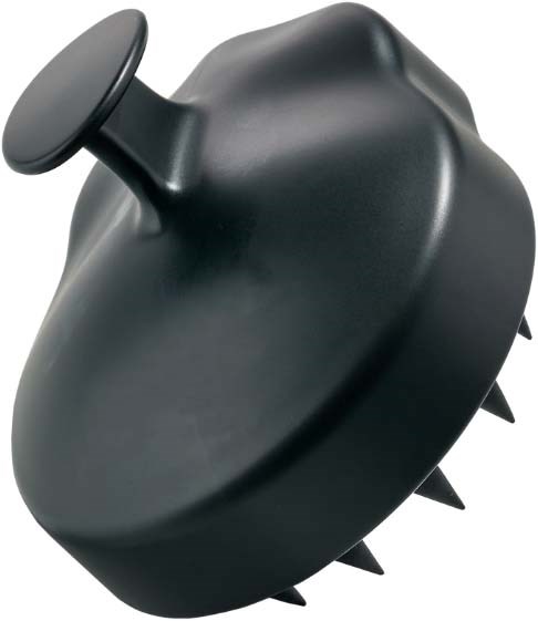 A black, rounded object with spikes, resembling a toy or a massager tool.