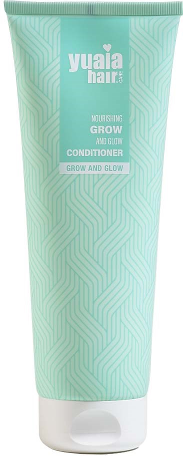 A green tube of Yuaia hair conditioner with a geometric pattern and a white cap.