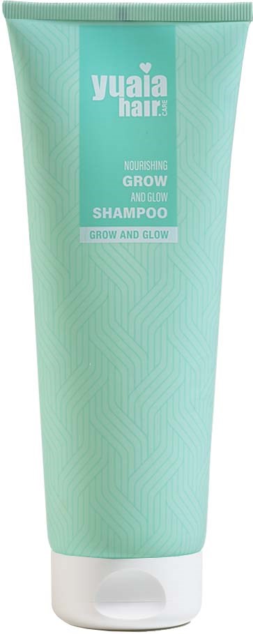 A light green shampoo bottle with a white flip-top cap, labeled for nourishing and growing hair.