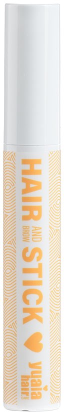 A white lip balm tube with orange text that says "HAIR and STICK" and a small heart symbol.