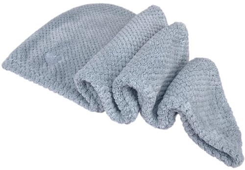 A light blue cleaning cloth, partly rolled up, made of soft, textured fabric.