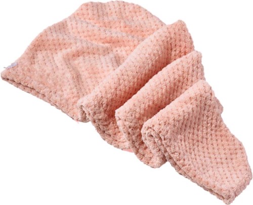 A set of four pink, soft, textured washcloths or towels. They are folded and stacked, showing different sizes.