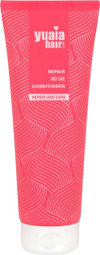 Pink tube of Yuapä Hair Repair and Care Conditioner with wave-like patterns and white cap.
