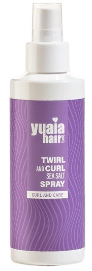 A white bottle with a purple label, stating it is a sea salt spray for curls and care.