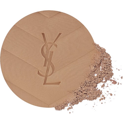 Pressed powder compact with the Yves Saint Laurent logo, some powder spilled out.