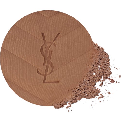 A compact YSL makeup powder with a powder spill on the side.