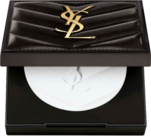 A black Yves Saint Laurent makeup box with a face illustration inside and the logo on top.