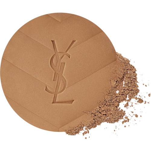 Solidin paino, jossa YSL-logo ja hieman irronnut puuteri.