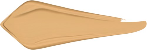Ein beigenfarbener Klecks aus Creme oder Farbe mit spitzem Ende auf schwarzem Hintergrund.