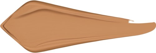 Ein beige Fleck cremiger Substanz, geformt wie ein Tropfen oder langes Oval.