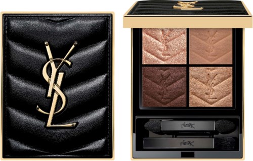 A luxury makeup palette with four eyeshadow shades and a mirror, in a gold and black case. The palette is opened.