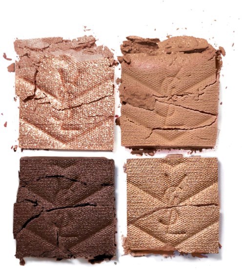 Four different shades of crushed makeup eyeshadow in square pans are shown. Light pink, beige, dark brown, and tan shades.