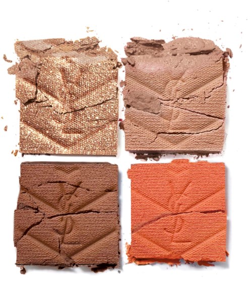 Vier Quadratstücke Make-up-Puder: schimmerndes Gold, hellbraun, dunkelbraun und orange, alle zerbrochen.