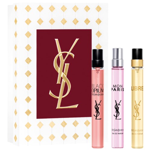 Yves Saint Laurent -logo ja kolme tuoksupulloa edessä, pinkki, vaaleanpunainen ja kulta.