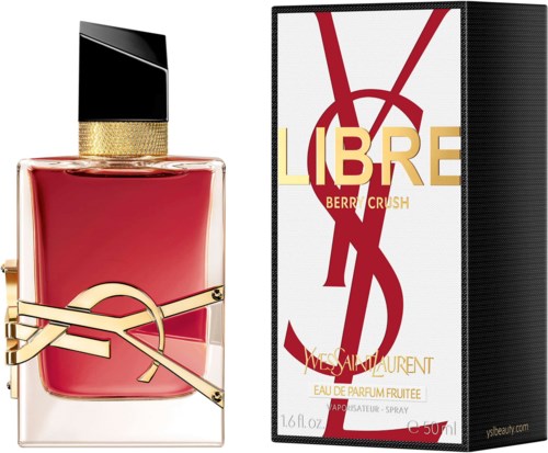 Eine Flasche Yves Saint Laurent Libre Parfüm neben der Verpackung mit rotem und goldfarbenem Design, Name und Infos.