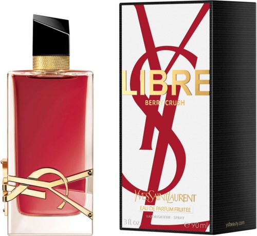 Yves Saint Laurent Parfümflasche in Rot mit schwarzem und goldfarbenem Deckel, neben einer Schachtel mit 'LIBRE BERRY CRUSH.'