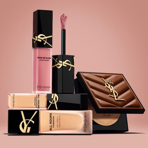 Yves Saint Laurent makeup products, including lipstick, blush, and compact, arranged on a pink background.
