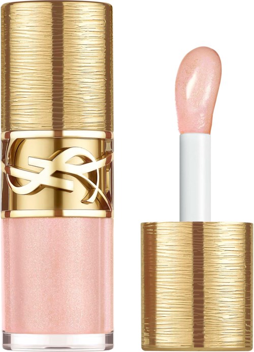 Ett sminkhöjdpunkts- eller gloss med guldkapsel och en liten pinne med rosa kräm inuti.