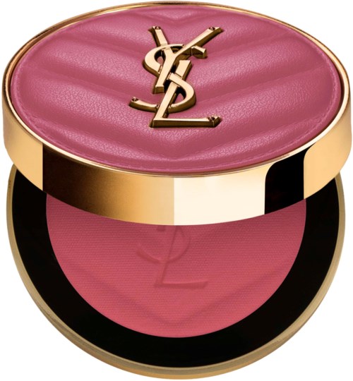 A round, pink makeup compact with a gold YSL logo on top and matching pink powder inside.