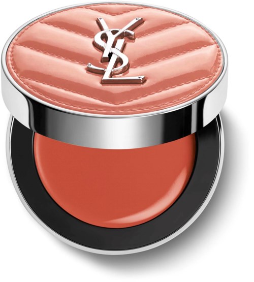 Lip balm i en rund behållare med rosa mönstrad topp och YSL-logga.