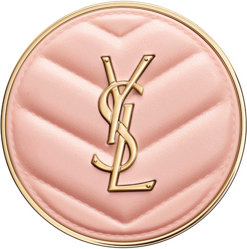 A round makeup compact with pink quilted surface and gold Yves Saint Laurent logo.