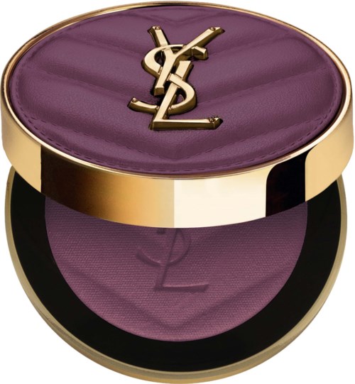 A purple blush compact with gold edges and a "YSL" logo on the top. The powder inside matches the lid.