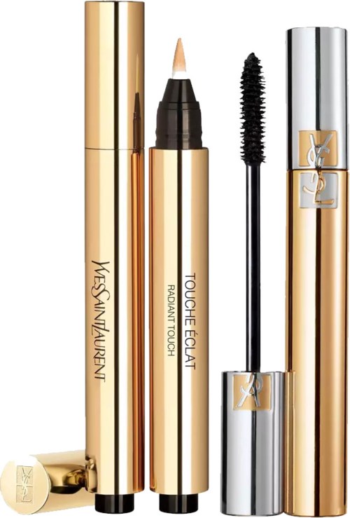 Twee luxe YSL make-up producten in goud en zilver, één met een stick en één met een kwast staan rechtop.