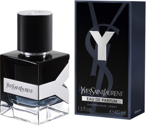 Ein Parfümflasche mit schwarz-weißem Design neben einer Schachtel mit Yves Saint Laurent Logo und Text.