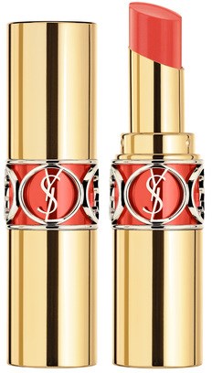 Ett guld- och rött Yves Saint Laurent läppstift med locket avtaget, som visar läppstiftet inuti.