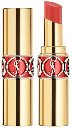 Två guld och röda läppstiftshylsor, en med läppstift och en stängd. YSL-loggan är synlig.