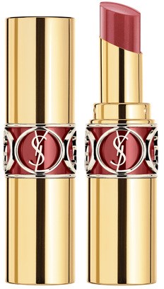 Ett läppstift med guldkapsling, delvis öppet som visar rosa-röd läppstiftet. Det har Yves Saint Laurent-loggan.