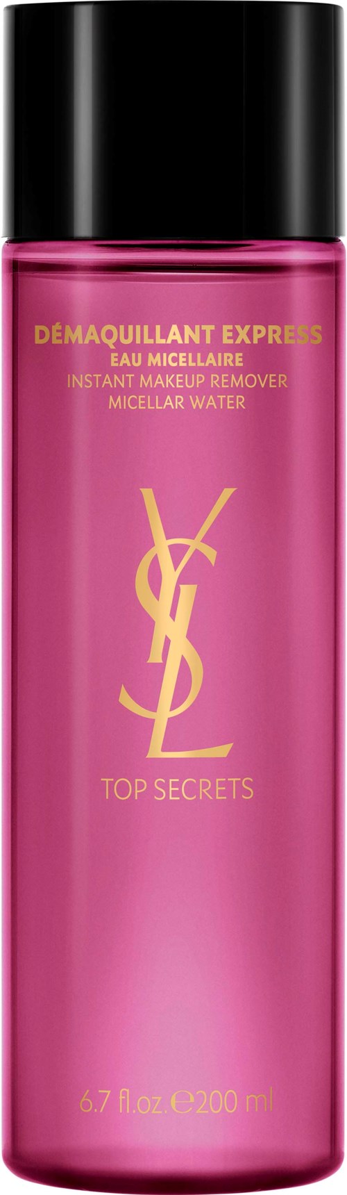 Een roze flesje met zwarte dop, YSL-logo en tekst voor make-up remover. De fles is lang en cilindrisch.