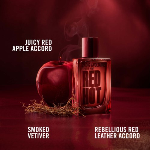 Red perfume bottle with black text, apple and moss elements on a red background.