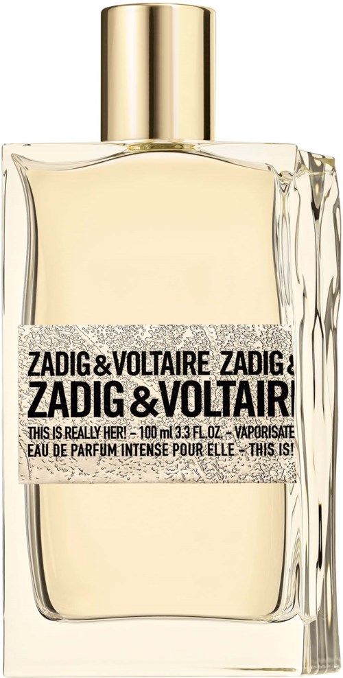 Ein Parfümflasche mit goldener Kappe und einem Etikett mit Zadig & Voltaire, enthält hellfarbige Flüssigkeit.