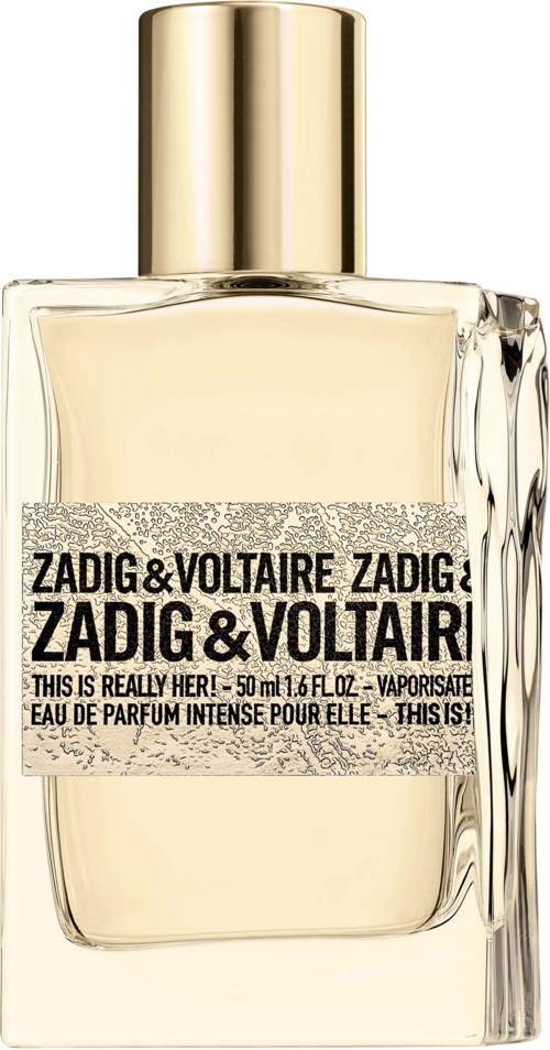 Ein Parfümflasche mit goldener Kappe, transparentem Glas und einem Etikett mit 'ZADIG & VOLTAIRE' in schwarzer Schrift.