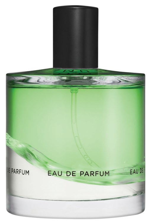 Vihreä hajuvetelpullo, jonka päässä on musta korkki ja teksti 'Eau de Parfum'.