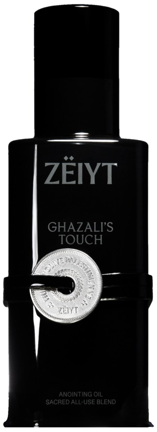 Svart flaska med etikett som visar märket Zeiyt och produkten Ghazal's Touch helig olja.