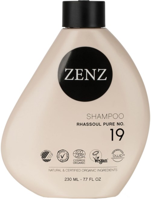 A beige shampoo bottle with a black cap, labeled 'ZENZ' and 'RHASSOUL PURE NO. 19'. It has certification icons.