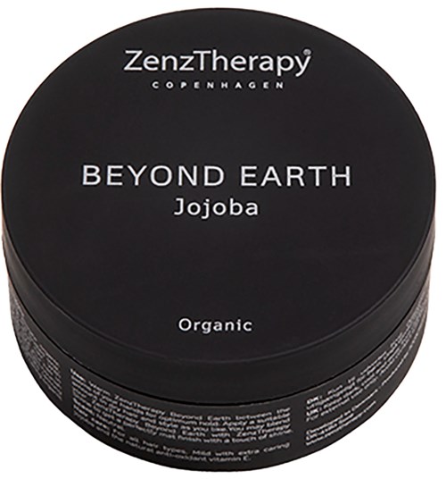 Ein schwarzer runder Behälter mit der Aufschrift 'BEYOND EARTH Jojoba' von ZenzTherapy, was auf ein bio-zertifiziertes Produkt hinweist.