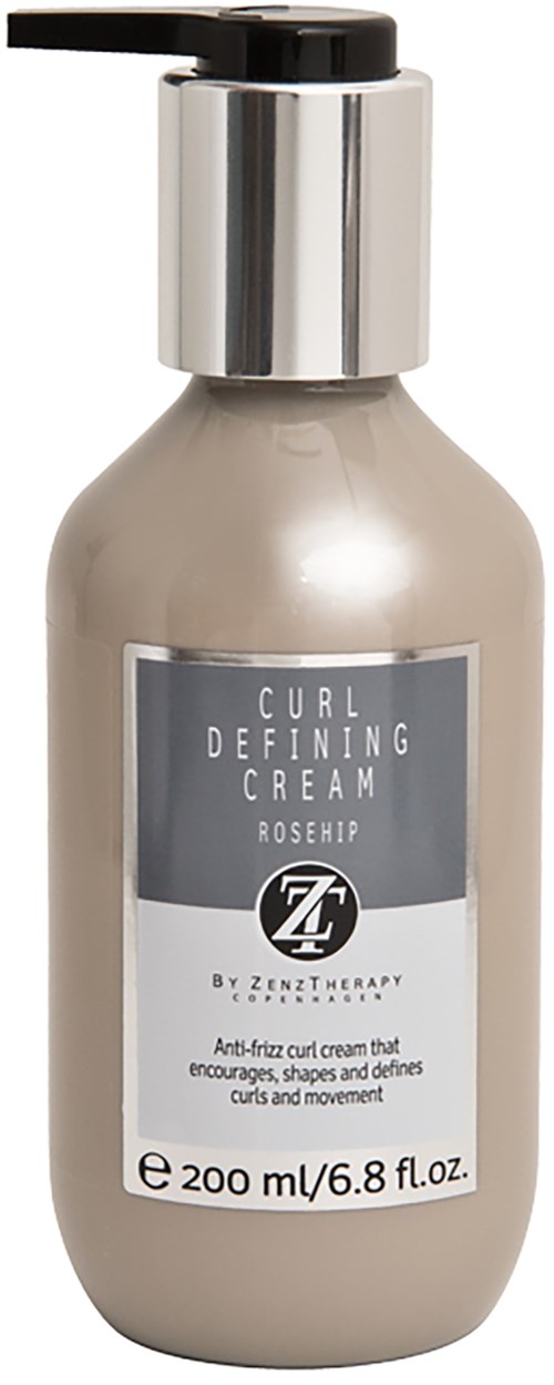 Eine beige Flasche mit silberner Kappe, beschriftet 'Curl Defining Cream Rosehip' von Zenz Therapy, für lockiges Haar.