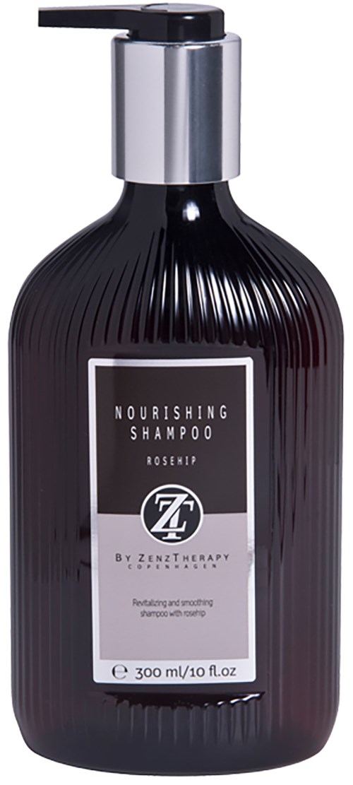 Eine dunkle Flasche mit silberner Pumpe, beschriftet 'Nourishing Shampoo' mit Hagebutte, von Zenz Therapy, 300 ml.
