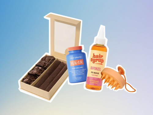 Hårvårdsset med en låda av hårförlängningar, hårfärg, hårsyraspray och en hårbottenmassageapparat.