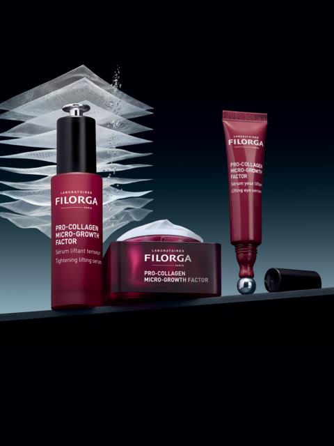 Filorga Pro-Collagen Micro-Growth Factor hudvårdsprodukter med spray, burk och tub mot en mörk bakgrund.