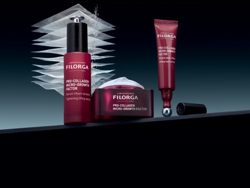 Filorga Pro-Collagen Micro-Glow-produkter med förpackning visas, inklusive serum, kräm och ögonkräm, mot mörk bakgrund.